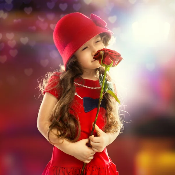 Bambina con rosa — Foto Stock