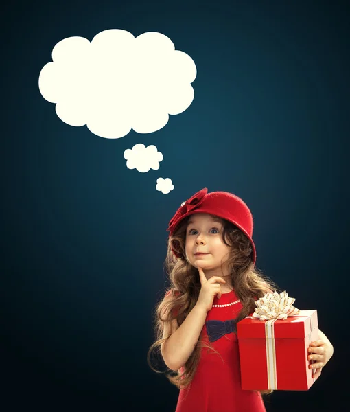 Happy child girl with gift box — Stock Photo, Image