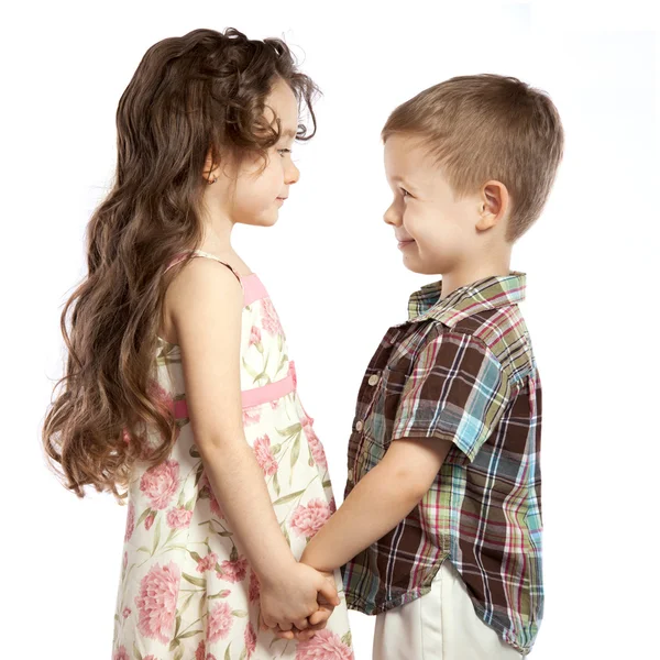 Little girl holding the boy's hand — Stock Photo, Image