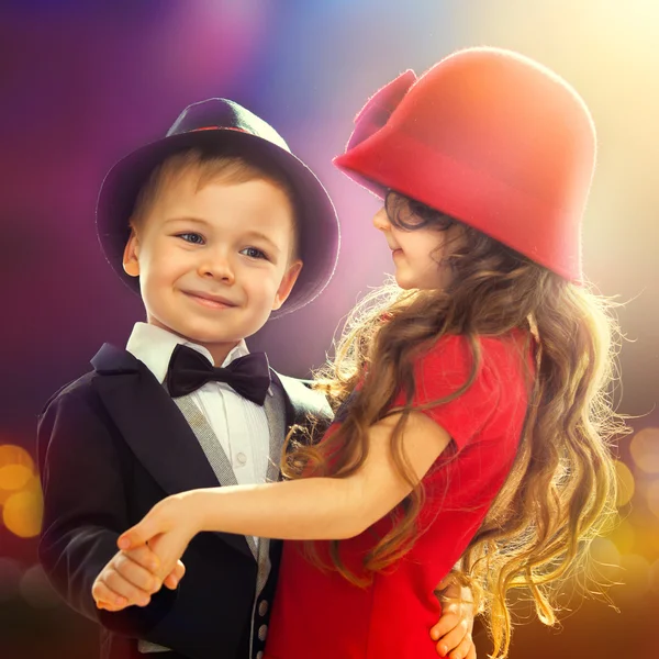 Lovely little boy and girl dancing — Stock Photo, Image