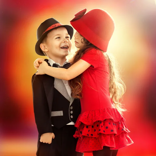 Little boy and girl hugging — Stock Photo, Image