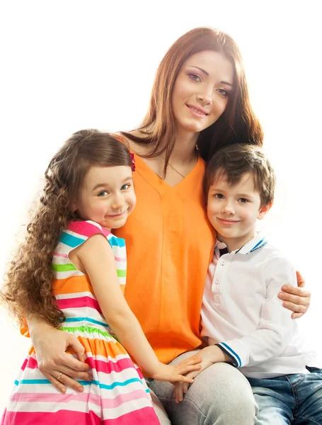 Happy mother with her daughter and son — Stock Photo, Image