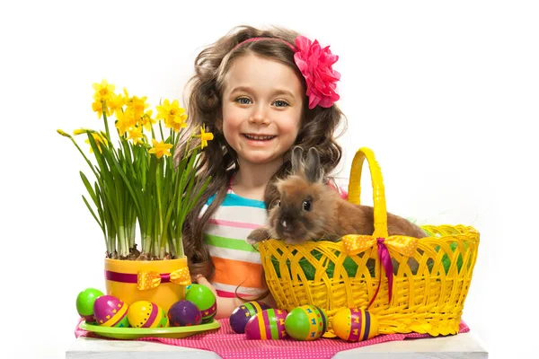 Happy little girl with easter rabbit and eggs — Stock Photo, Image