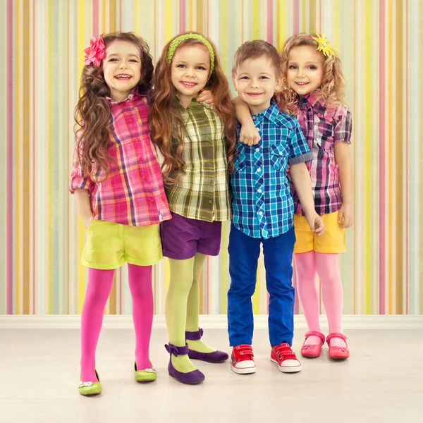 Cute fashion kids are standing together — Stock Photo, Image