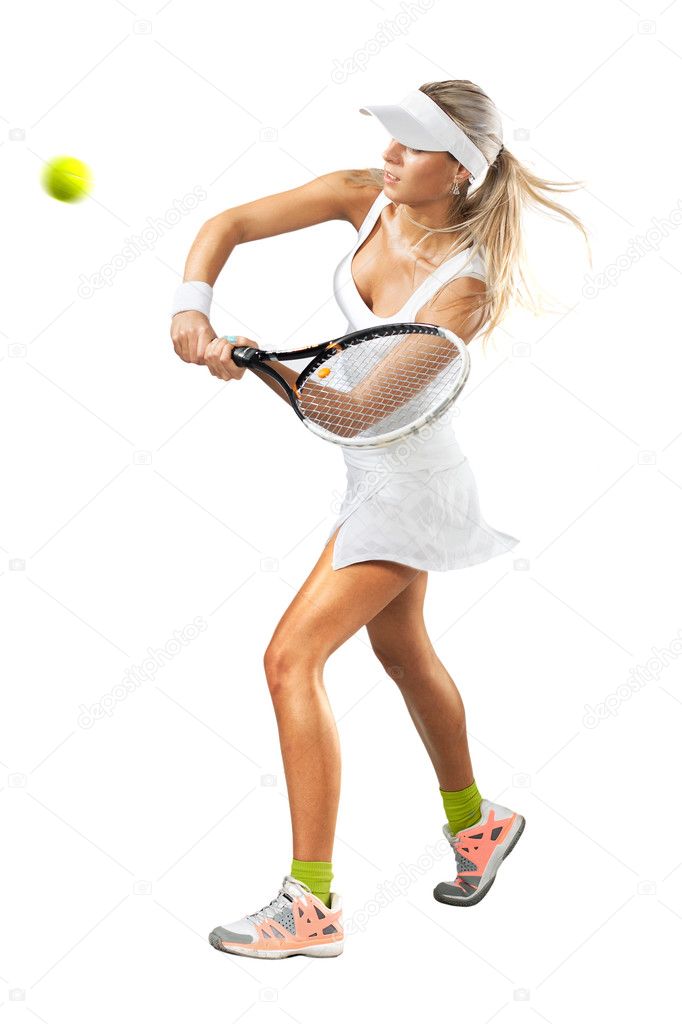 Woman in sportswear plays tennis at training