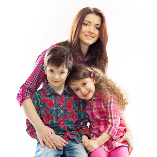 Happy mother with her daughter and son — Stock Photo, Image