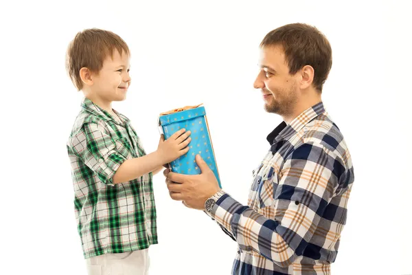 Happy son gives his father gift — Stock Photo, Image