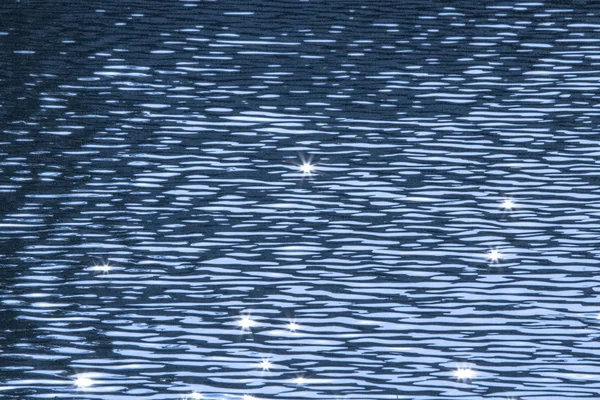 Fondo de agua azul brillante en un lago Fotos de stock