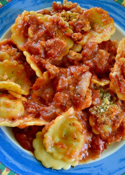 Spinach and ricotta ravioli on a colorful plate