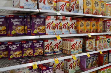 Cereal boxes on the shelves of a Coles supermarket  clipart