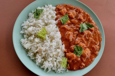 An Indian style mild chicken curry with basmati rice