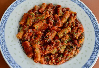 Sicilian tuna bake with finely chopped parsley