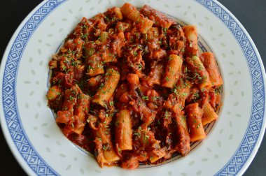 Sicilian tuna bake with finely chopped parsley