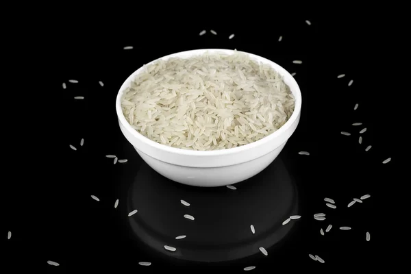 Assiette de riz sur fond noir — Photo