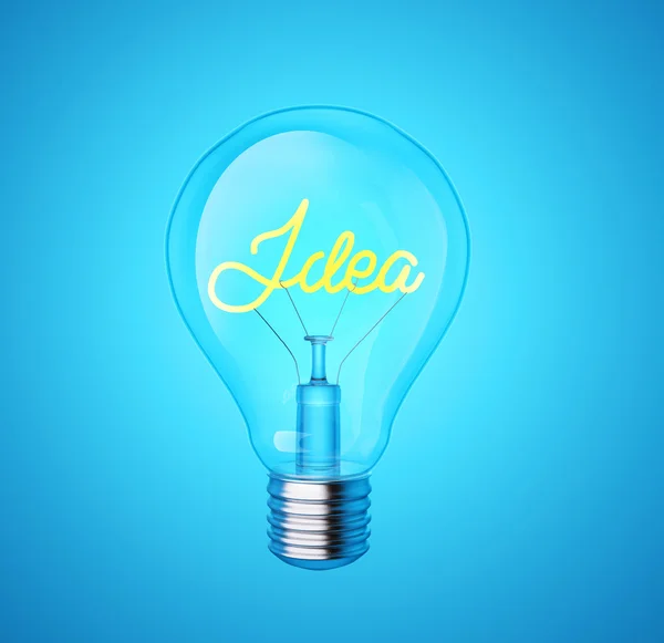 Голубая лампочка со словом "идея" — стоковое фото