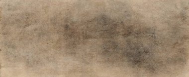 Eski kahverengi kağıt parşömen arka plan tasarımı. Üzüntülü vintage lekeler, mürekkep lekeleri ve solmuş eski püskü bir merkez. Zarif antika bej rengi.