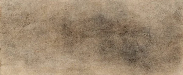 Eski kahverengi kağıt parşömen arka plan tasarımı. Üzüntülü vintage lekeler, mürekkep lekeleri ve solmuş eski püskü bir merkez. Zarif antika bej rengi.