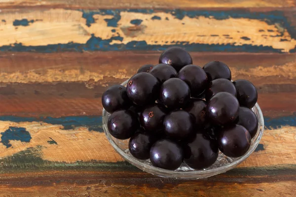 stock image Berry Jaboticaba in glas bowl on wooden table