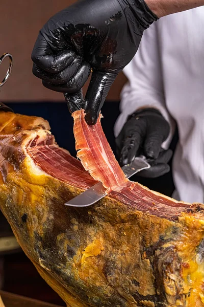 Girl Cuts Jamon Selective Focus Man Cuts Meat Prosciutto Ham — Stock Photo, Image