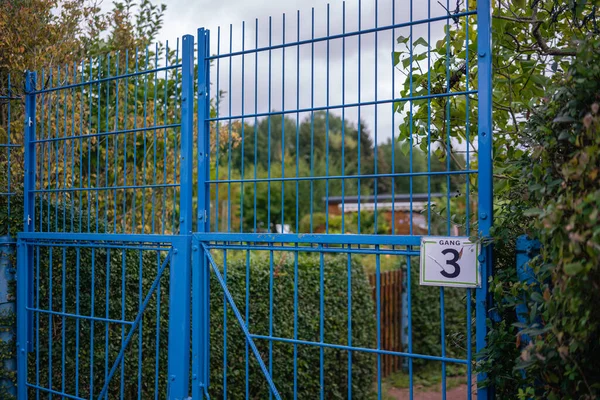closed blue gate to a private area