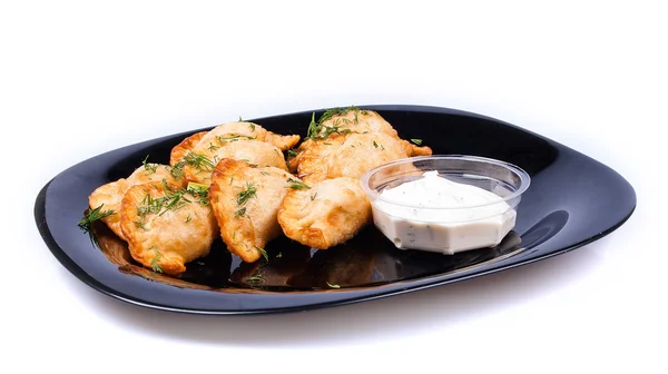 köfte soslu bir plaka üzerinde