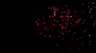 Hareketli noktalar ve çizgiler olan koyu kırmızı soyut bir zemin. Model.