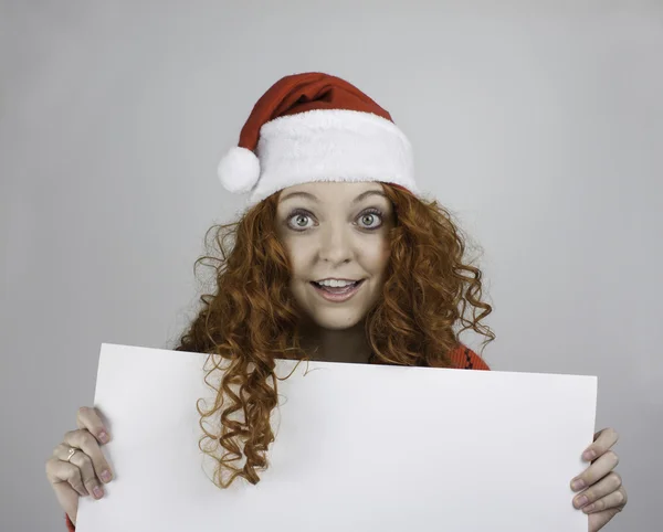 Donna con un segno in bianco — Foto Stock