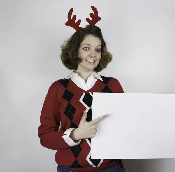 Young woman wearing antlers — Stock Photo, Image