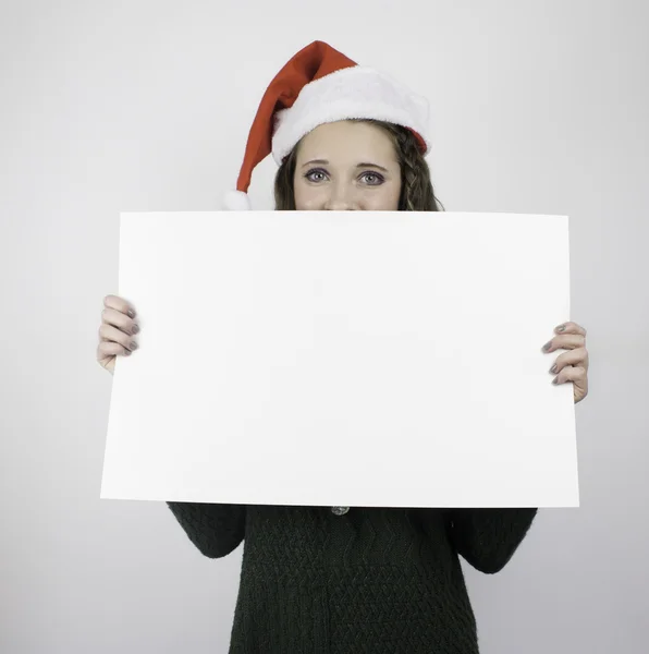 Young woman holding blank sign — Stock Photo, Image