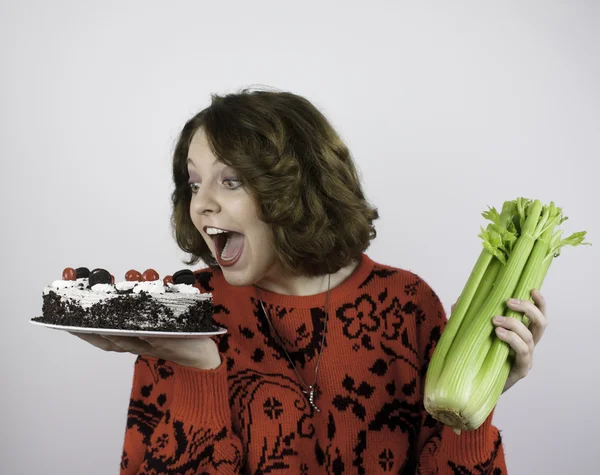 Pretty young woman trying to diet — Stock Photo, Image