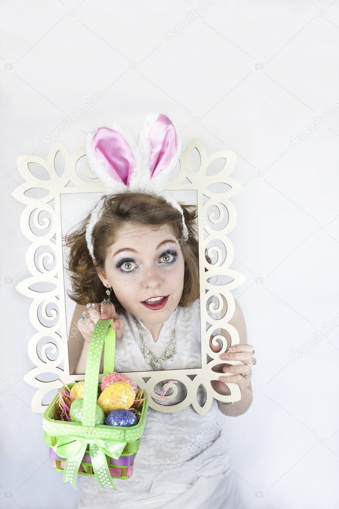 Woman coming out of picture frame