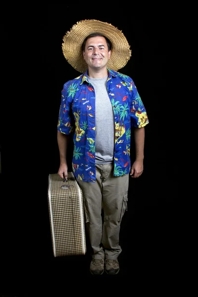 Young silly man traveler, full body on black background — Stock Photo, Image