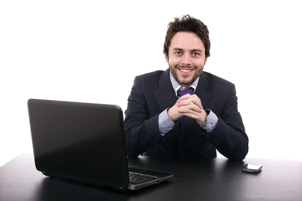 Jeune homme d'affaires travaillant avec est ordinateur portable Images De Stock Libres De Droits