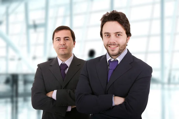 Two business men standing at the office — Stock Photo, Image