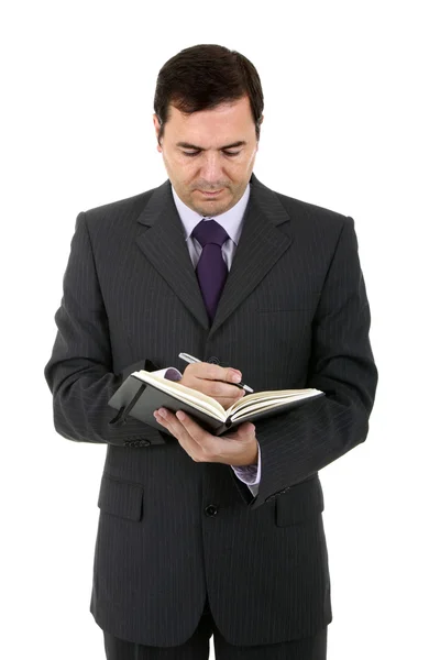 Geschäftsmann mit Notizbuch auf weißem Hintergrund Stockbild