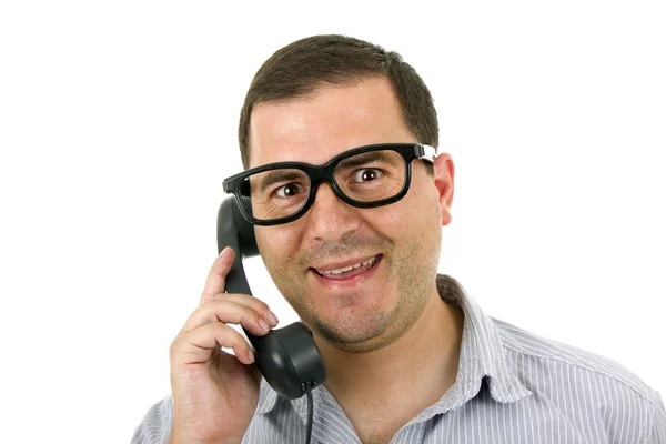 A telefon és a szemüveg, elszigetelt fehér fiatal férfi — Stock Fotó