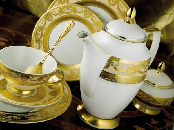 White tableware set with gold trim — Stock Photo, Image