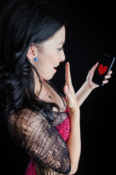 Happy Woman With Heart Image on Phone — Stock Photo, Image