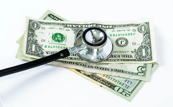 Stethoscope Laying on Dollar Bills — Stock Photo, Image