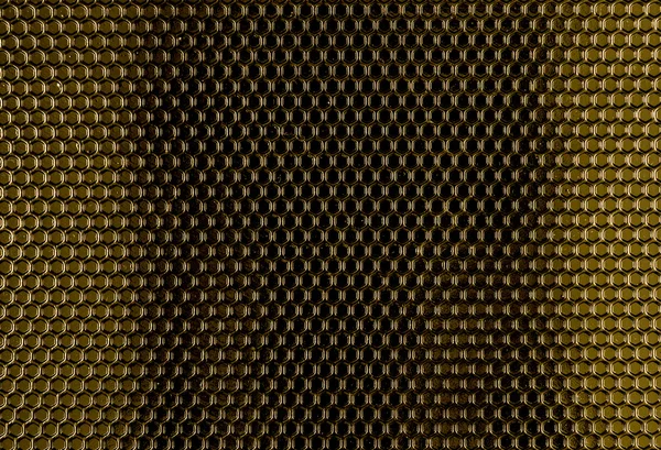 Textura de células hexadecimais de metal amarelo — Fotografia de Stock