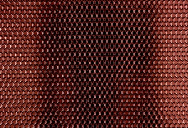 Texture des cellules hexagonales en métal rouge — Photo