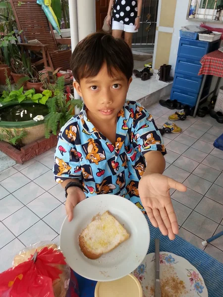 The boys are toast with butter and sugar — Stock Photo, Image