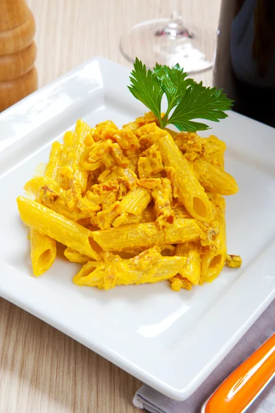 Penne with speck and saffron — Stock Photo, Image