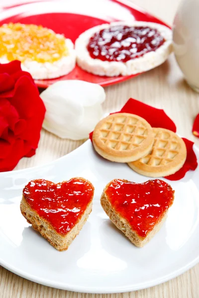 Breakfast with love and red hearths of jam — Stock Photo, Image