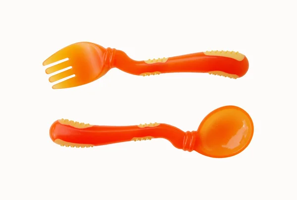 Cuchara de bebé naranja y tenedor — Foto de Stock