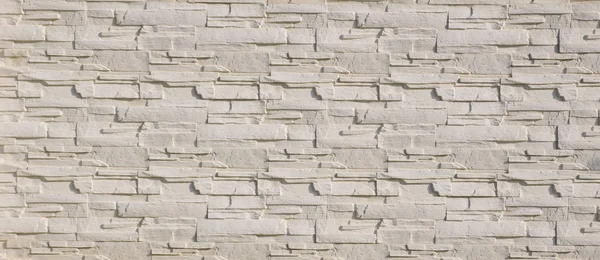 Біла облицювальна плитка імітує камені — стокове фото