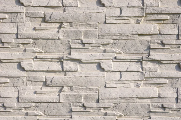 Revestimiento blanco azulejos imitando piedras —  Fotos de Stock