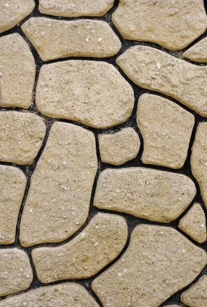 Wall of boulders with black fugue — Stock Photo, Image