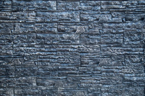 Black Tiles Imitating Stone Wall Closeu — Foto Stock