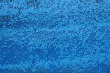 Blue spots on old repaired boat close u